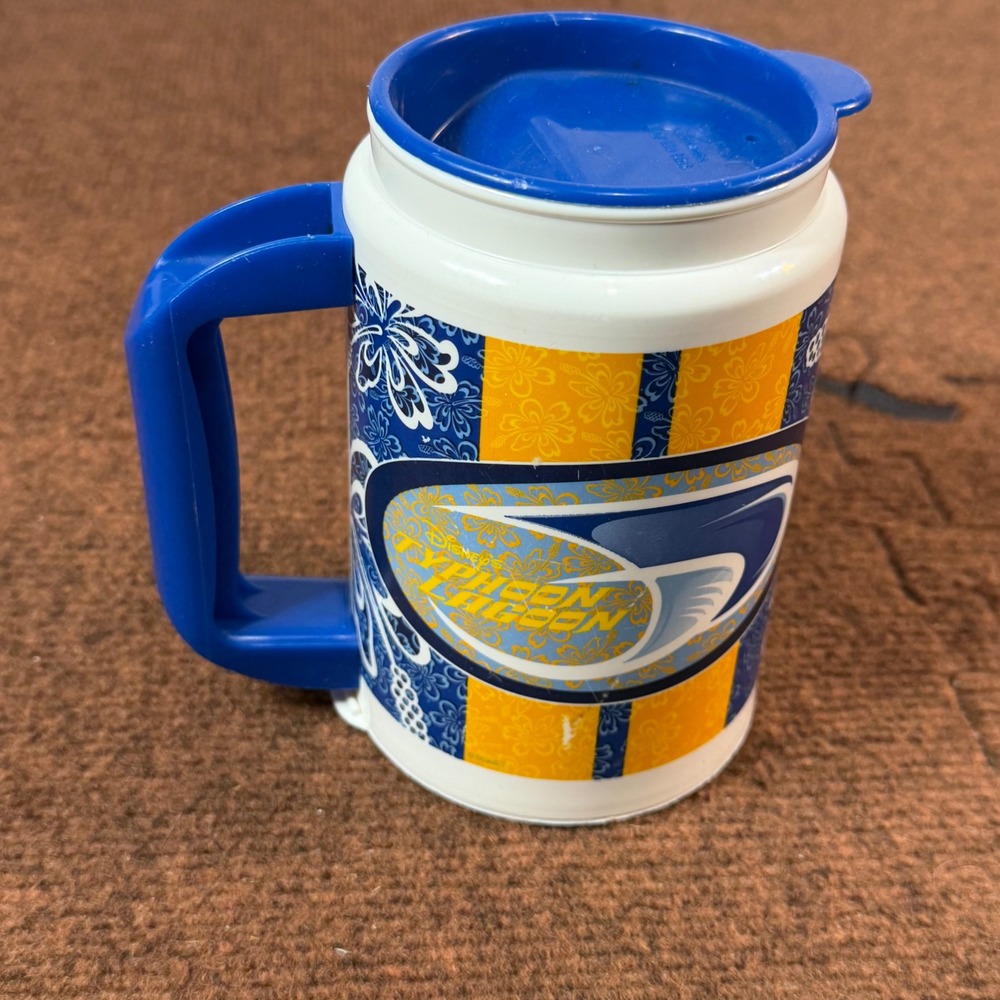 Disney Typhoon Lagoon Souvenir Travel Mug Blue Yellow Floral Insulated Plastic